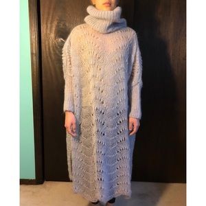 Knee-length gray sweater dress with turtleneck